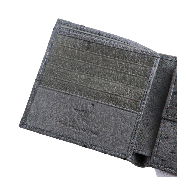 A view of the interior of the luxury ostrich leather wallet, showing the multiple card slots and the 'Genuine Ostrich Skin' stamp.