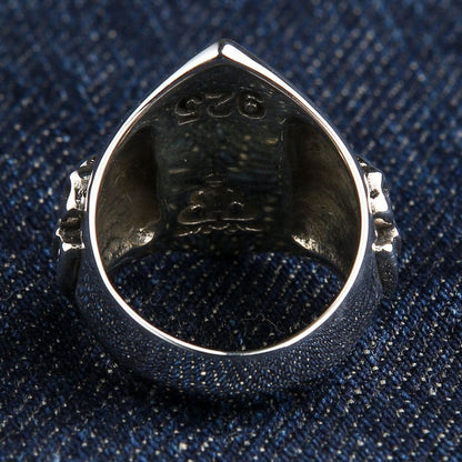 The inside of the 1% ring band, displaying the .925 sterling silver authenticity hallmark stamp.