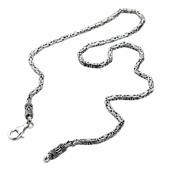 3mm Byzantine silver chain with unclasped lobster closure displaying full chain length and weave detail