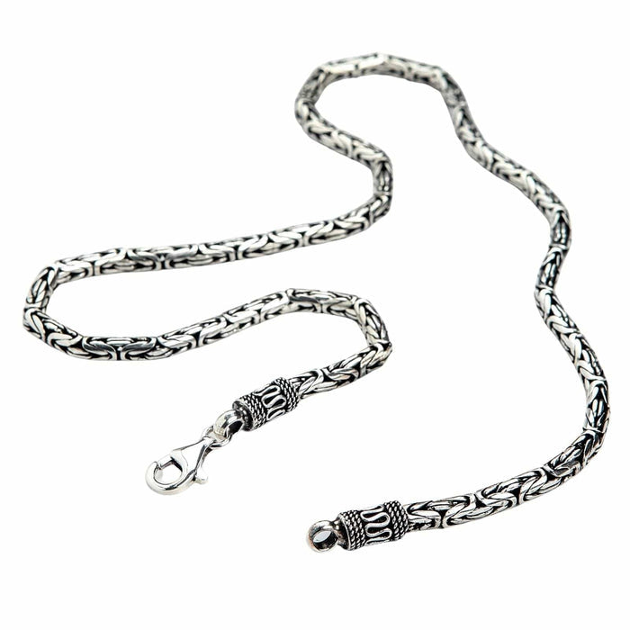 solid 925 silver Byzantine chain, showing the quality of the metal and the woven pattern.