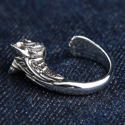 Owl wisdom symbol ring back view displaying hand-carved wing feather pattern in oxidized sterling silver