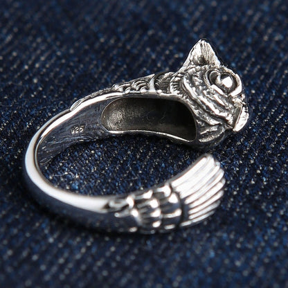 Genuine 925 sterling silver owl ring angled view with visible authenticity stamp and artisan craftsmanship details