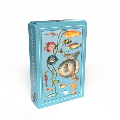 The Penny Puzzle Aquarium Dreams 99 Piece Jigsaw Puzzle comes in a blue box with colorful illustrated fish and aquatic plants, perfect for vintage puzzle lovers.