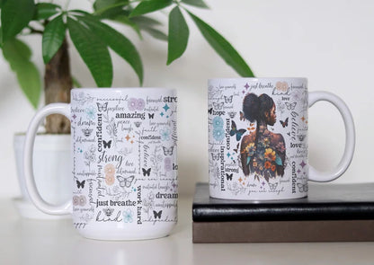 Bloom, Believe & Become white ceramic coffee mug featuring a floral woman, colorful butterflies and positive affirmations including strong, confident, dream, hope, kind and just breathe, available in 11 oz and 15 oz sizes.
