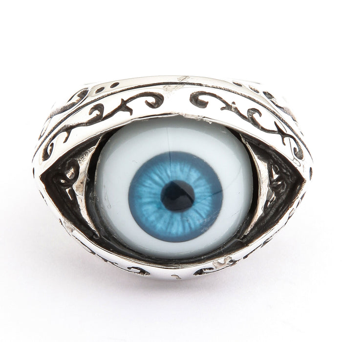 Front view of a blue eyeball ring in sterling silver with a sky-blue iris and oxidized filigree almond bezel