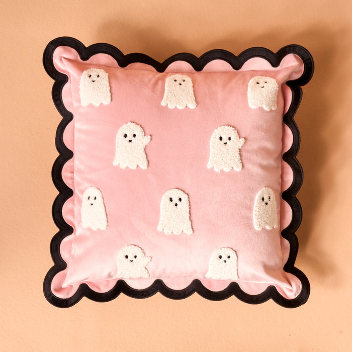 The Boo Crew Scalloped Square Throw Pillow by The Darling Effect features a pink square design with black scalloped edges and nine white ghost appliques—each with dot eyes—making it a charming addition to your sofa or pillow set.