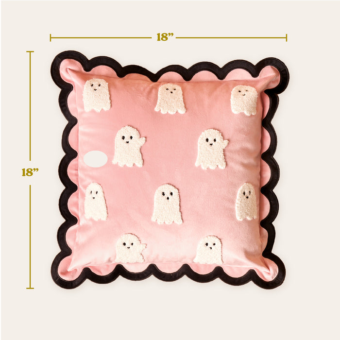 The Darling Effect’s Boo Crew Scalloped Square Throw Pillow features an 18-inch pink design with black trim and white terry cloth ghosts, adding a playful Halloween touch to your sofa or pillow collection.