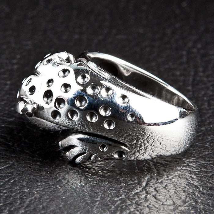 Handcrafted cheetah ring back view showing spotted texture and smooth silver band
