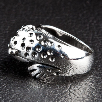 Handcrafted cheetah ring back view showing spotted texture and smooth silver band