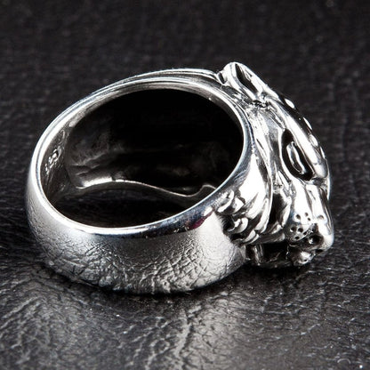 Cheetah statement ring in sterling silver angled view with 925 stamp visible inside band