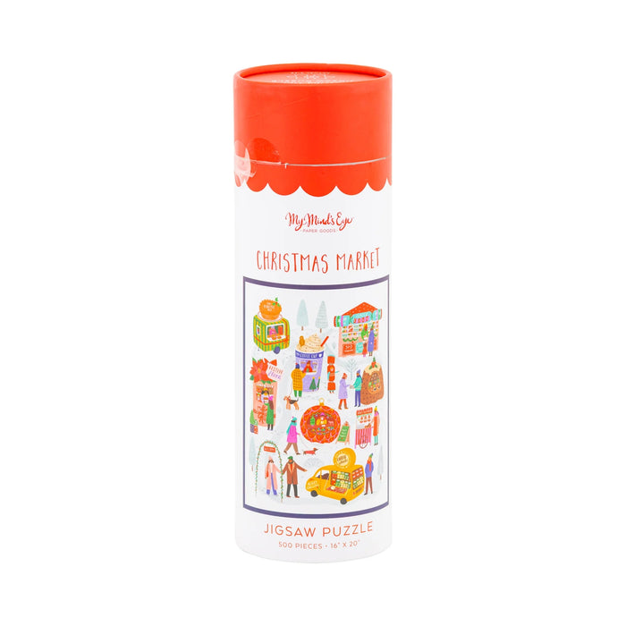 The My Mind's Eye Christmas Market | 500 Piece Jigsaw Puzzle comes in a cylindrical box featuring vibrant market scene artwork, perfect for holiday fun.