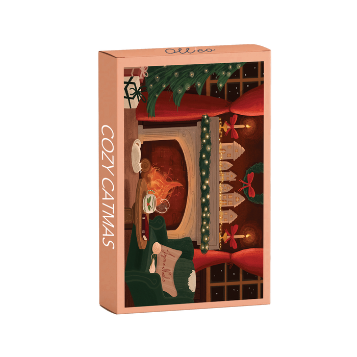 The Cozy Catmas | 99 Piece Jigsaw Puzzle by Olleo Puzzles comes in a rectangular box featuring festive cat artwork and includes a completed 99-piece puzzle illustrated by Charlène Girodet.