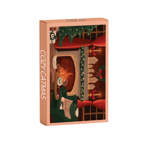The Cozy Catmas | 99 Piece Jigsaw Puzzle by Olleo Puzzles comes in a rectangular box featuring festive cat artwork and includes a completed 99-piece puzzle illustrated by Charlène Girodet.