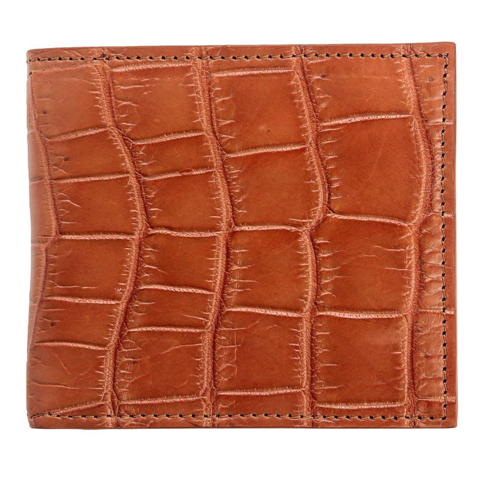 Exterior of the light brown crocodile bifold in close framing, showing large belly tiles and the stitched side seam.