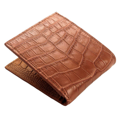 Corner view of the closed bifold where the ostrich leg skin lining shows as a pebbled band beneath the crocodile shell.