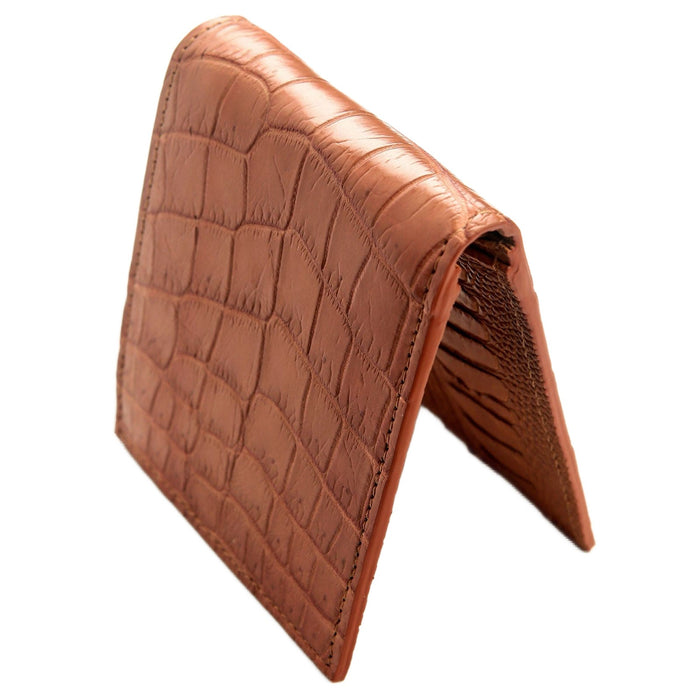 Standing upright on its fold, the bifold shows the flexible crocodile spine and a glimpse of the leg skin interior.
