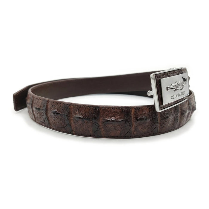 Side view of curled crocodile backbone belt with silver chrome buckle visible on the right edge