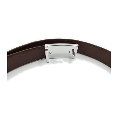 Reverse side of silver chrome auto-lock buckle plate with prong, screws, and smooth black inner leather