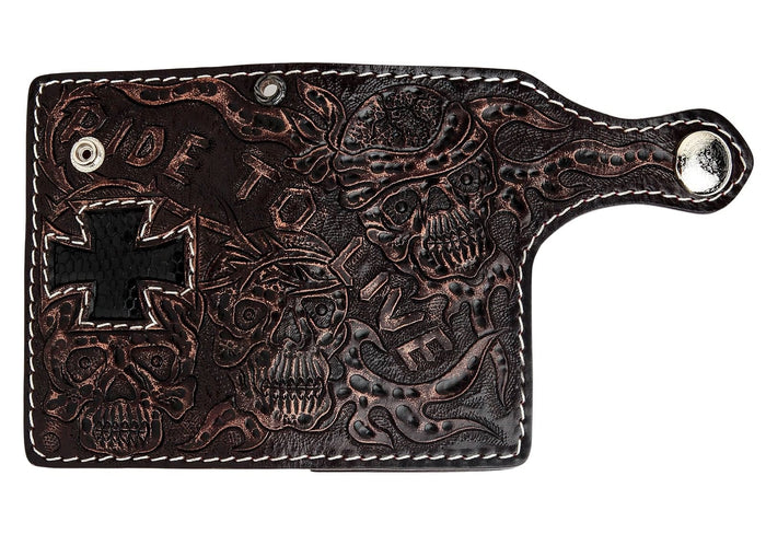 Unfolded flat view showcasing the complete hand-tooled skull and flames design with lizard cross inlay on dark cowhide.