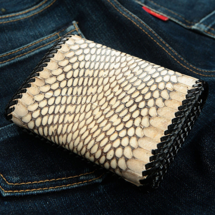 Back view of the snake leather wallet highlighting the continuous scale pattern and silver grommet.