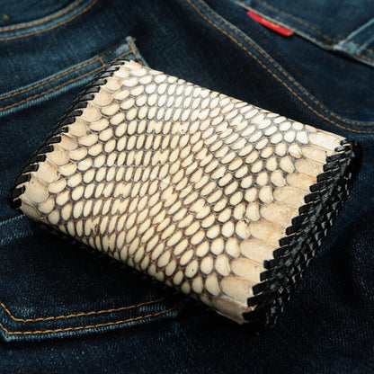 Back view of the snake leather wallet highlighting the continuous scale pattern and silver grommet.