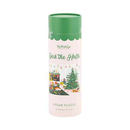 The Deck the Halls | 500 Piece Jigsaw Puzzle by My Mind's Eye comes in a cylindrical container and features a festive Christmas tree with holiday decorations.