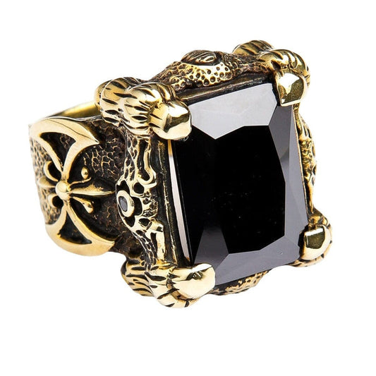 A gothic-style solid brass dragon claw ring, featuring a rugged, scaly band and a huge 35-carat black onyx.