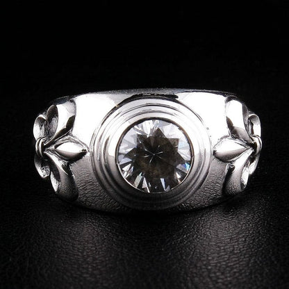 Front view of handcrafted sterling silver ring with 3-carat topaz and dual Fleur De Lis symbols