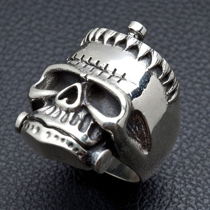 Left side view of sterling silver Frankenstein monster skull ring with detailed craftsmanship