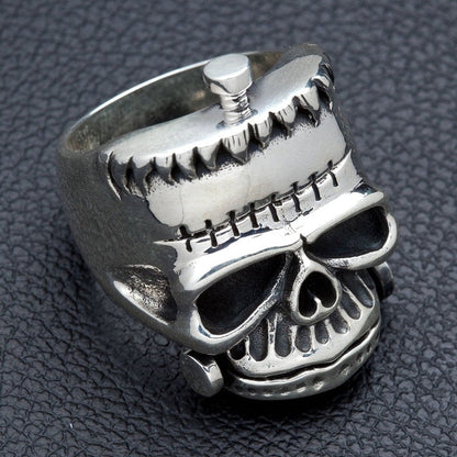 Top view of Frankenstein skull ring highlighting the iconic head bolt and stitch pattern in sterling silver