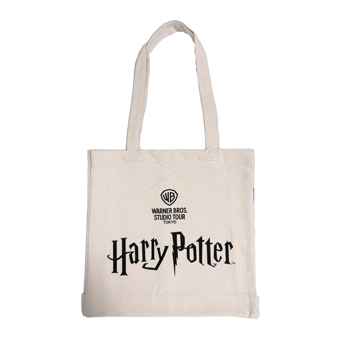 Beige tote bag with 'Harry Potter' and Warner Bros. Studio Tour logo on a white background