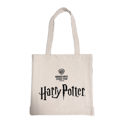 Beige tote bag with 'Harry Potter' and Warner Bros. Studio Tour logo on a white background