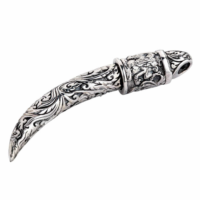 A unique piece of spiritual jewelry: a solid sterling silver tusk featuring the powerful Hindu god Ganesh on its cap.