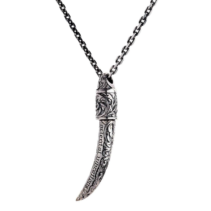 A powerful "Remover of Obstacles" talisman pendant, featuring a detailed Ganesh on a sterling silver tusk.
