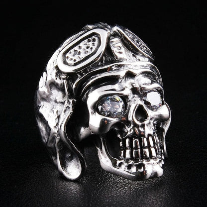 A solid sterling silver WW2 German aviator skull pilot ring, featuring a vintage helmet and brilliant diamond CZ eyes.