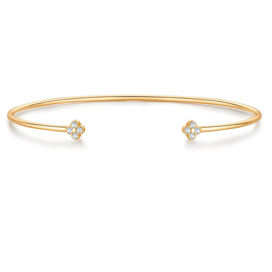 Goldener Armreif mit Blüten-Anhänger