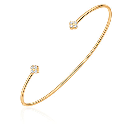 Goldener Armreif mit Blüten-Anhänger