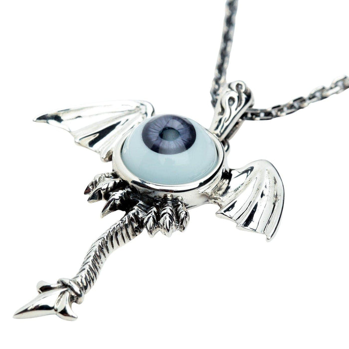 An alternative angle of the large statement gothic necklace, highlighting the detailed silverwork and purple eye.