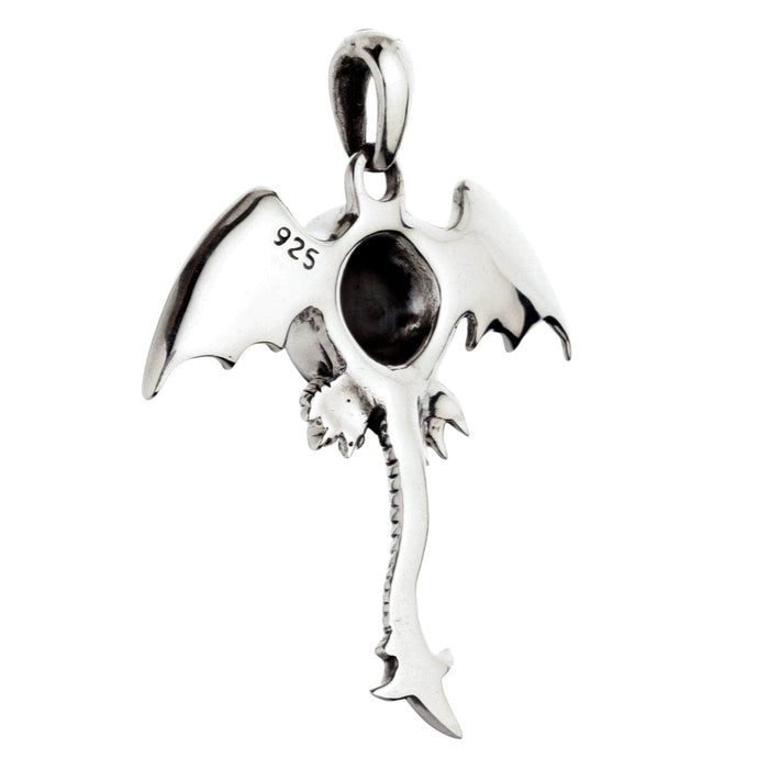 The back view of the winged monster pendant, showing its solid silver construction and the .925 hallmark stamp.