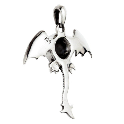 The back view of the winged monster pendant, showing its solid silver construction and the .925 hallmark stamp.
