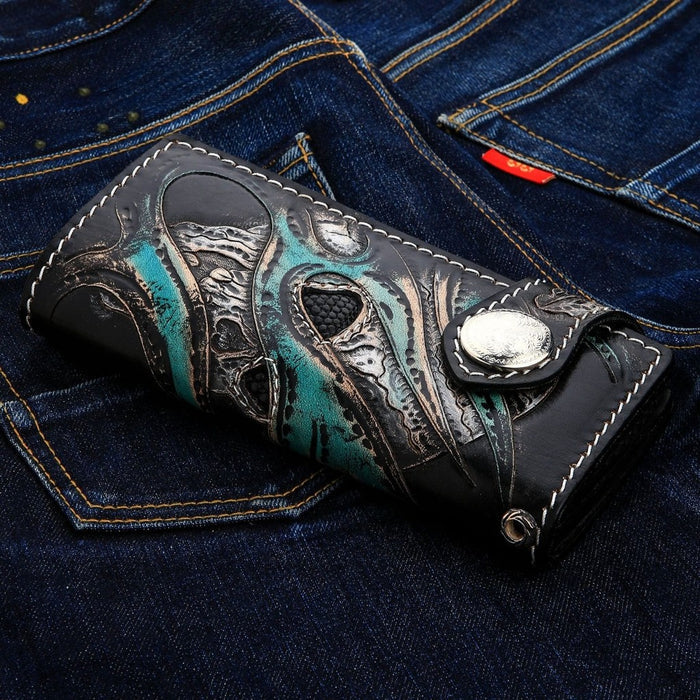 Full exterior view of biker wallet featuring green devil skull and flame inlay