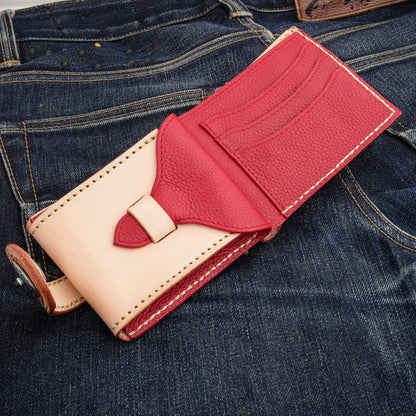 Open wallet interior in red pebbled leather with four angled card slots and a bill compartment