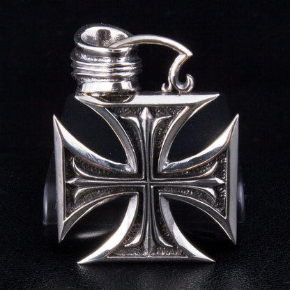 Front close-up of 925 sterling silver iron cross pendant with polished arms and oxidized texture