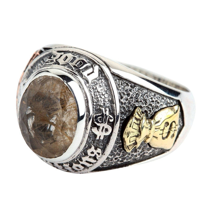 Side view of the rutilated quartz good luck ring, showing the brass money bag symbol.