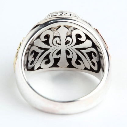 The inside of the 777 ring, showing the intricate scrollwork.