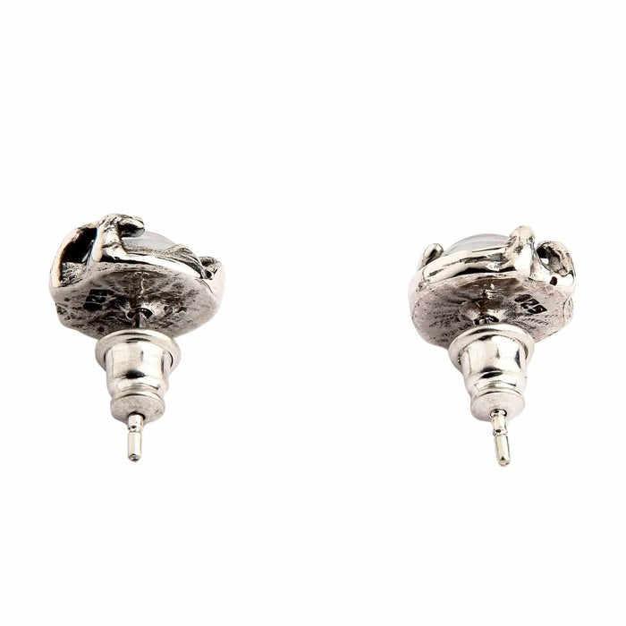 The back view of a pair of gothic eye stud earrings, clearly showing the 925 sterling silver hallmark and post.