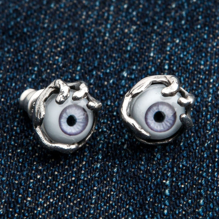 A premium pair of fantasy monster claw earrings, a unique and powerful piece of gothic eye jewelry.