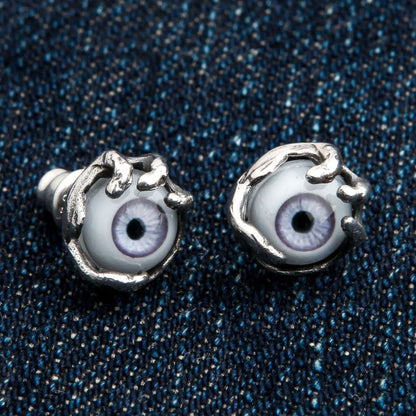 A premium pair of fantasy monster claw earrings, a unique and powerful piece of gothic eye jewelry.
