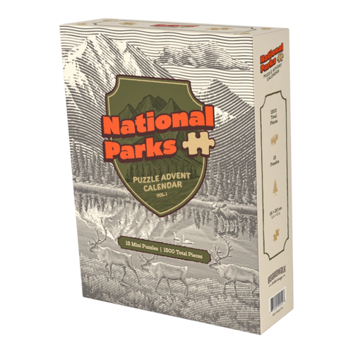 The National Parks Puzzle Advent Calendar Vol. 1 by Boardwalk Puzzle Company includes 15 mini park puzzles (1,500 pieces total) in a vintage-style box with mountains, trees, and elk—an ideal gift for travel lovers.