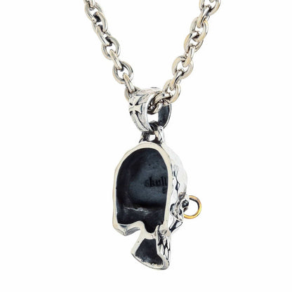 Hollow back of the .925 silver punk skull pendant on a chain, with the hallmark and a side view of the piercing ring.